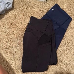 Navy and black lululemon leggings. Great condition. Size 4 align 7/8 leggings.